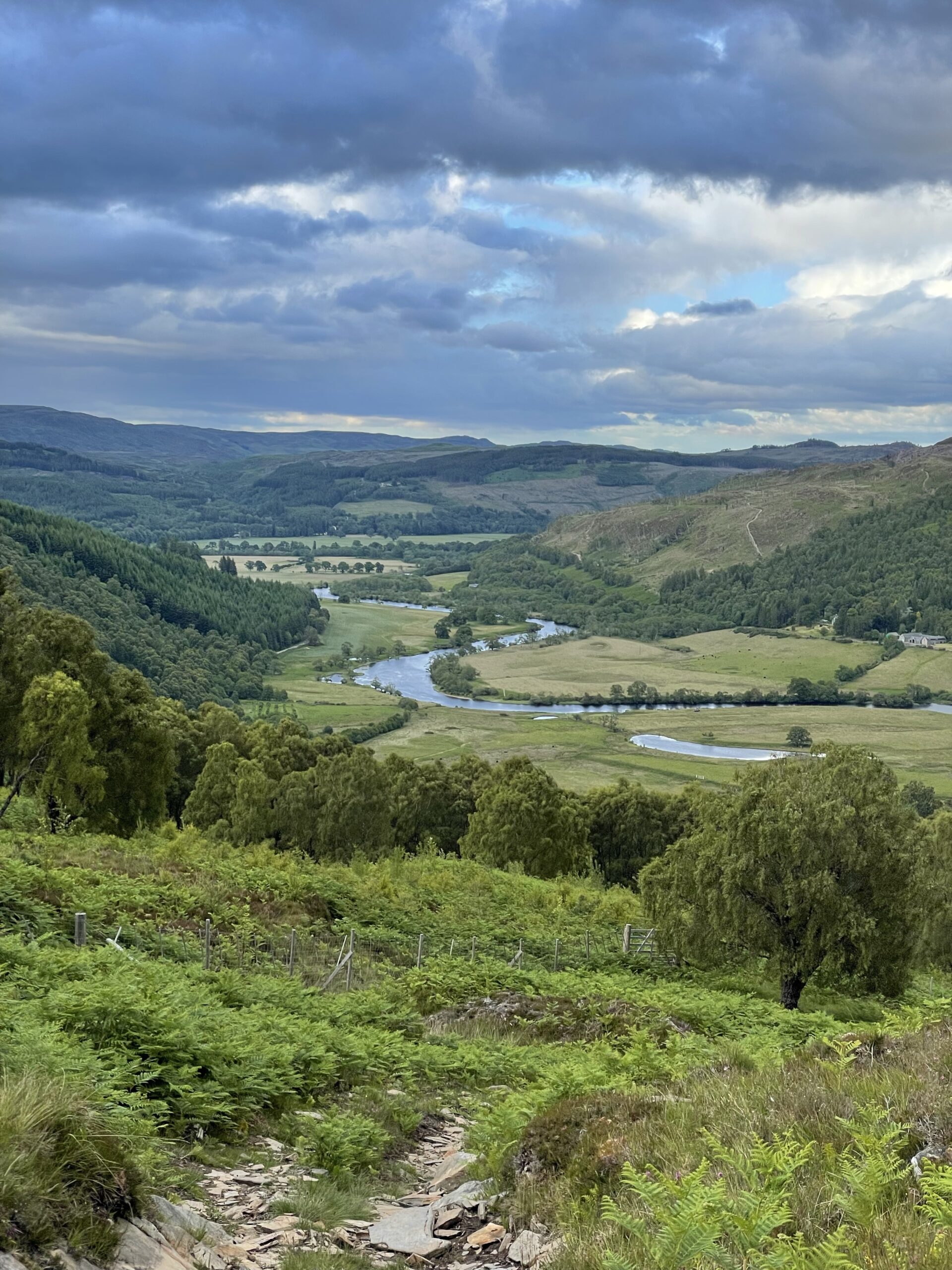 The lush green valley from the top of a mountain above the Eagle Brae property in Struy, Beauly Scotland