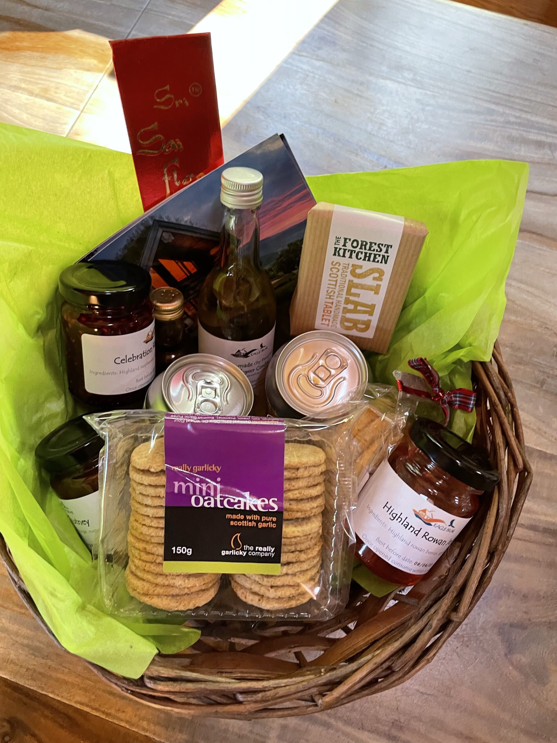 A welcome basket full of food and drink local to the area in the Scottish Highlands